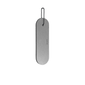 The Dangle - Long - Grey is a flat, oval-shaped metal reflector with a small hole at one end, attached to a short ball chain and shown against a white background. Gate21.ee