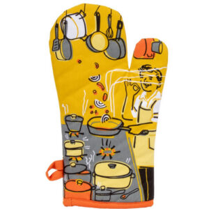 A yellow “Man with a pan - Oven Mitt” from BlueQ, featuring an illustration of a person cooking at the cooker, surrounded by steaming pots, pans, and utensils. The person is holding a spoon to taste the food, with shelves and cookware in the background. Gate21.ee