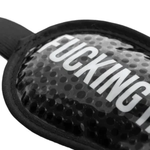 A close-up photo of the &ldquo;Fucking Hangover&rdquo; gel eye mask, a bold black padded mask with a textured surface and strap, featuring partially visible white text reading &ldquo;FUCKING HA...&rdquo;. Gate21.ee