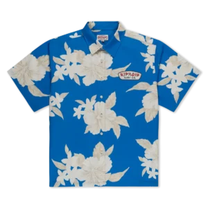 A short-sleeved Blue Shirt featuring a white hibiscus flower pattern and a small Ripkord Surf Co Button Up logo on the upper left chest. Gate21.ee