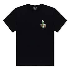 The Here All Along Tee - Black is a plain black RIPnDIP T-shirt featuring a small graphic of a cartoon character sitting on a chair, placed on the left chest area. Gate21.ee