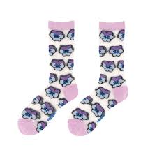 A pair of Pansies - Transparent Socks by Coucou Suzette, featuring white transparent fabric with pink toes, heels, and cuffs, decorated with a repeated cartoon pansy pattern in purple and blue. Gate21.ee