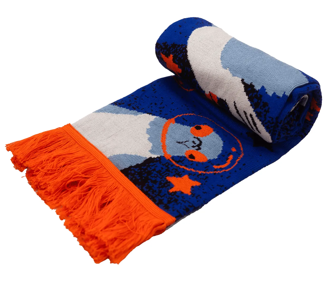 A rolled blue and orange woven “Pigeon - Organic” scarf with orange fringes, featuring a playful illustrative design of a stylised owl wearing glasses surrounded by stars. Gate21.ee
