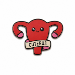 Here’s a rewritten sentence using your product data: The Cuterus - Pin features a cartoon uterus with a smiling face, raised arms, and pink boxing gloves. A banner at the bottom reads CUTERUS, and the playful design stands out against a plain white background, inspired by whimsical badges like “This is fine.”. Gate21.ee