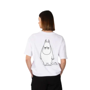 A person with straight, shoulder-length brown hair faces away, wearing the white Moomintroll Temper Heavy Ts, which features a large outlined drawing of a serious Moomin character. The background is plain white. Gate21.ee