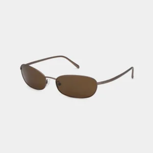 A pair of A. Kjærbede “Jack - Matte Brown” oval-shaped sunglasses featuring dark brown lenses and slim, matte brown metal arms, displayed against a plain white background. Gate21.ee