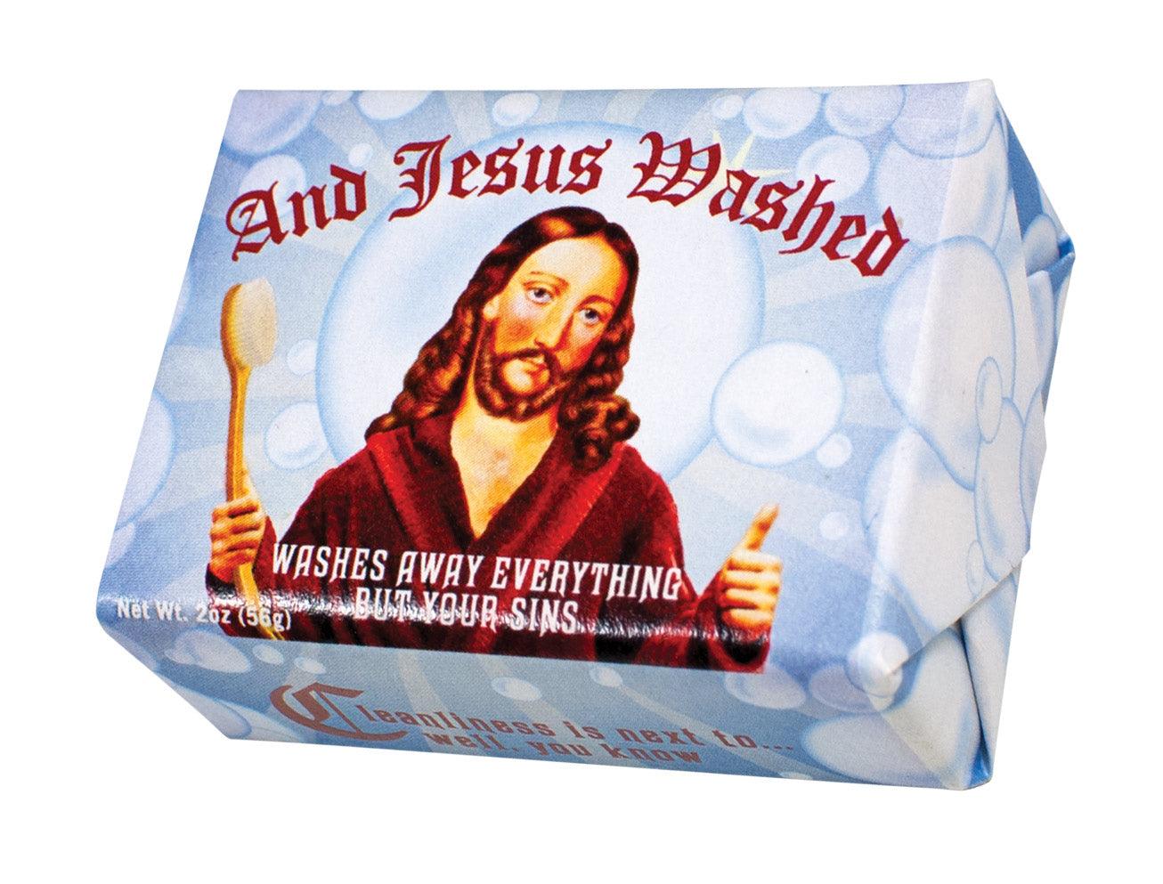 A bar of Jesus – Soap from the Unemployed Philosophers Guild, wrapped in blue packaging adorned with an illustration of Jesus holding a wooden spoon and the phrase, “And Jesus Washed and Washes away everything but your sins.”. Gate21.ee