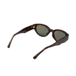 A pair of Winnie - Demi Tortoise sunglasses is shown from a rear angle, featuring dark lenses with the arms open and the inner portion of the tortoiseshell frames visible. Gate21.ee