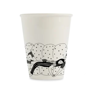 The Overthinking cup (Copy) is a white ceramic mug by Helen B, featuring a black-and-white illustration of a person in patterned clothing reclining on a spotty sofa. The design wraps around the lower half of the mug against a plain background. Gate21.ee