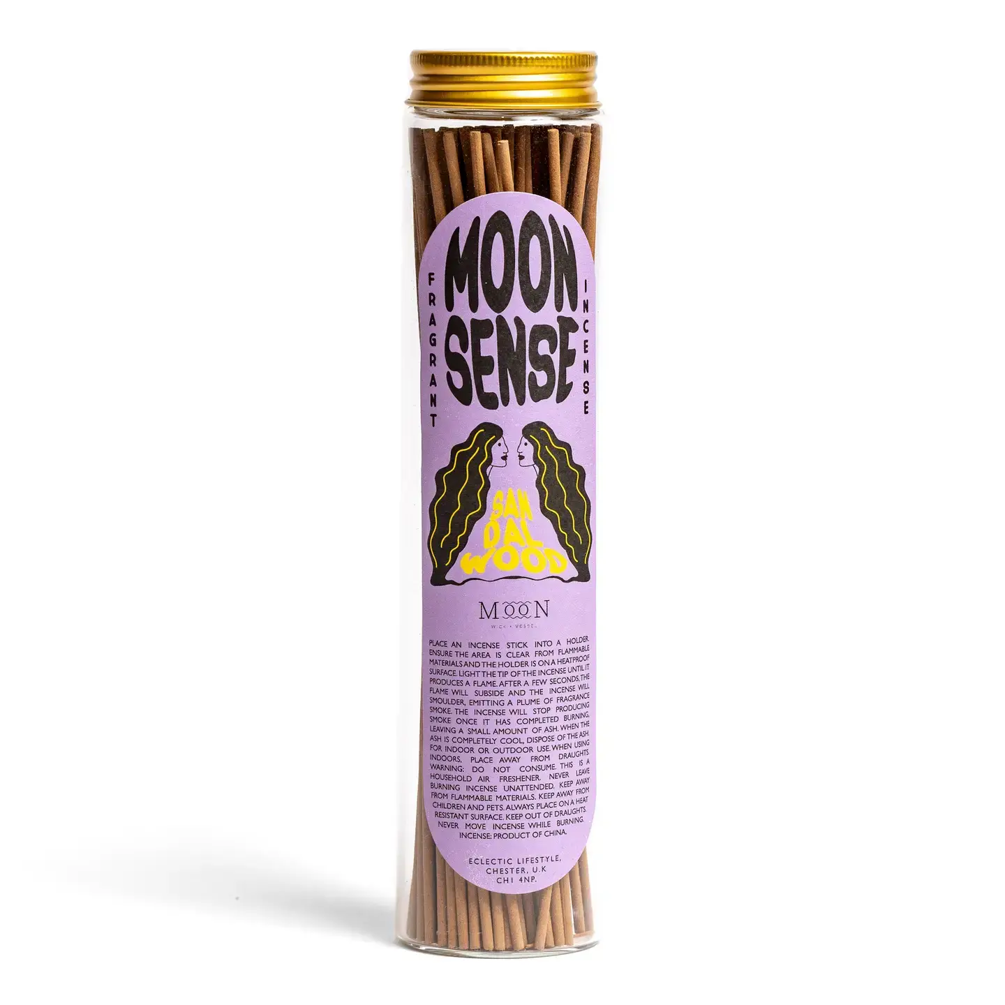 A clear jar with a gold lid holds 100 sandalwood incense sticks. The label reads “Moon Sense” and showcases a stylised design with a purple background, yellow figure, and black wavy elements. This unique home fragrance from Wick & Vessel is scented Moon Sense: Sandalwood. Gate21.ee